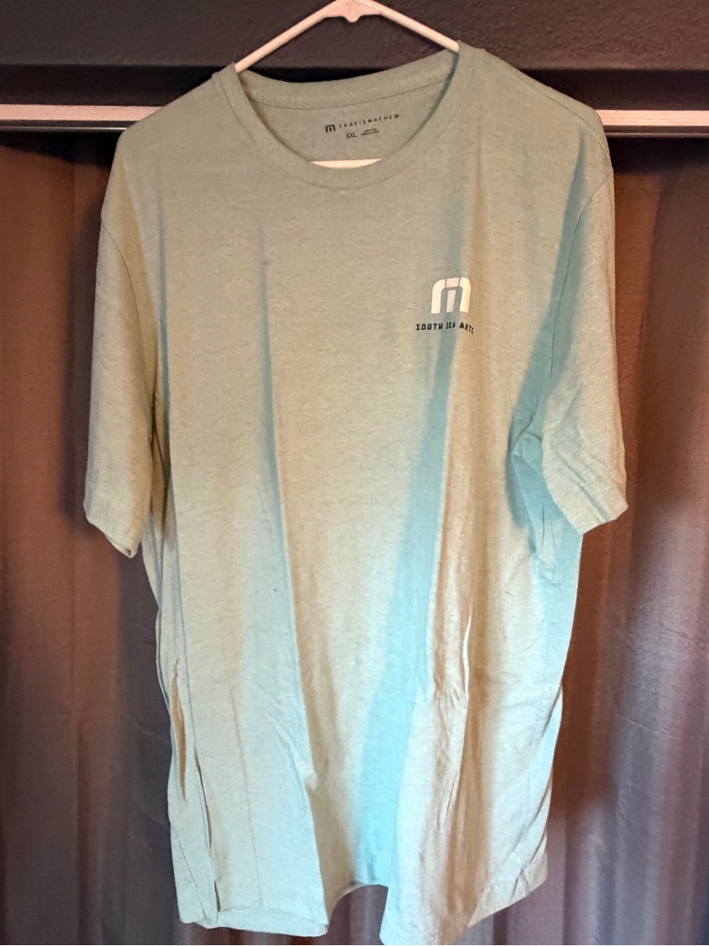 Travis Mathew Men’s Sage Green Logo Tee South Sea Arts collab